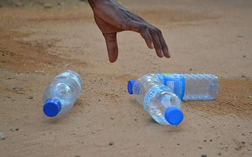 Water bottles on the beach