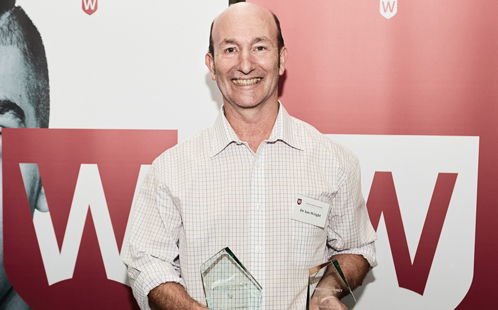 Ian Wright holding award 