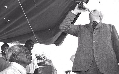 Whitlam drinking beer