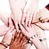 A group of peoples hands touching