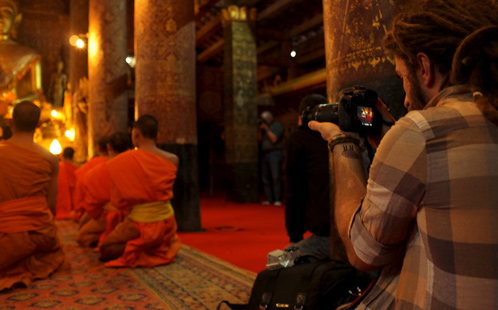 Monks being photographed