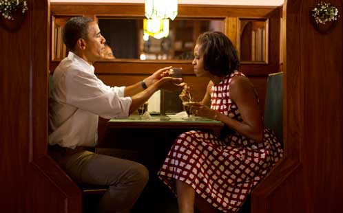 Barack and Michelle Obama in a diner