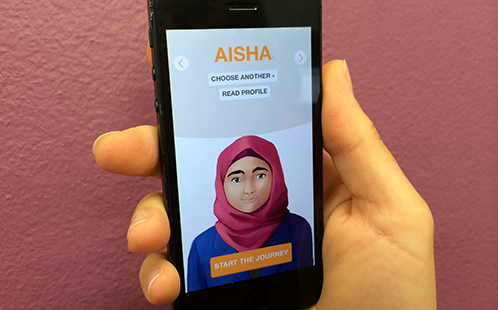 Holding a smart phone displaying the racism app