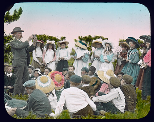 Charles T Musson, Lecturer in Botany and Entomology, giving a class outside to a group of school children [Hawkesbury Agricultural College (HAC)] c.1900 (P2745)
