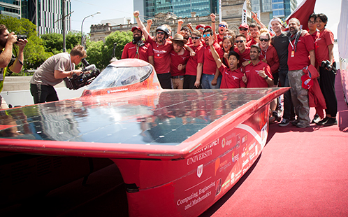 Solar Car team celebrate crossing finish line