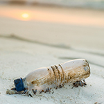 A plastic bottle discarded at the beach 